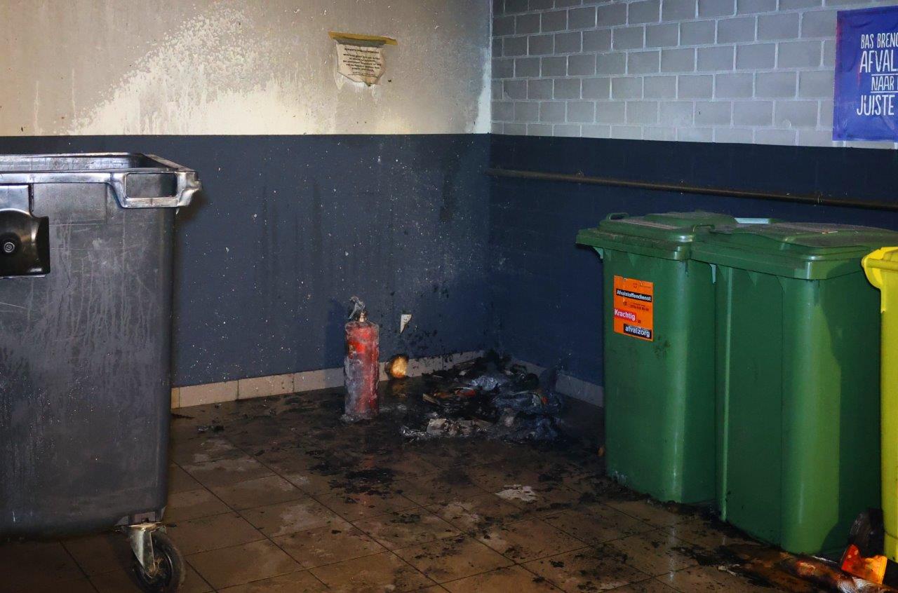 Verdachte aangehouden na brand in containerruimte van appartementencomplex