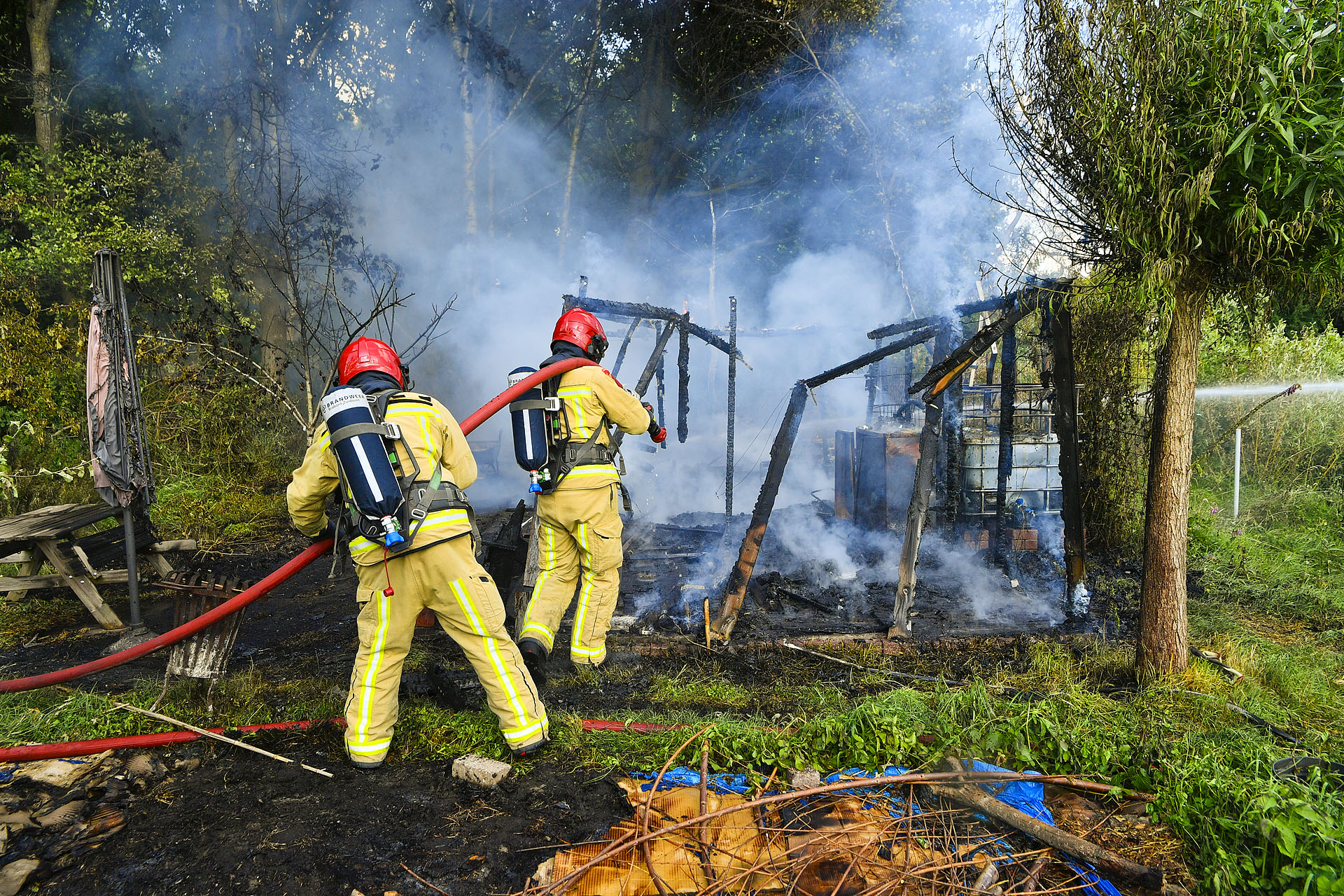 Tuinhuisje in lichterlaaie