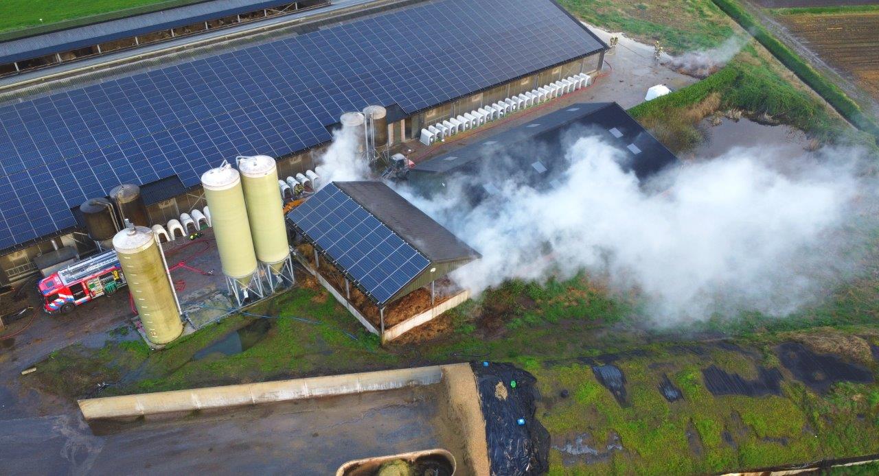 Brand in mestopslag bij boerenbedrijf